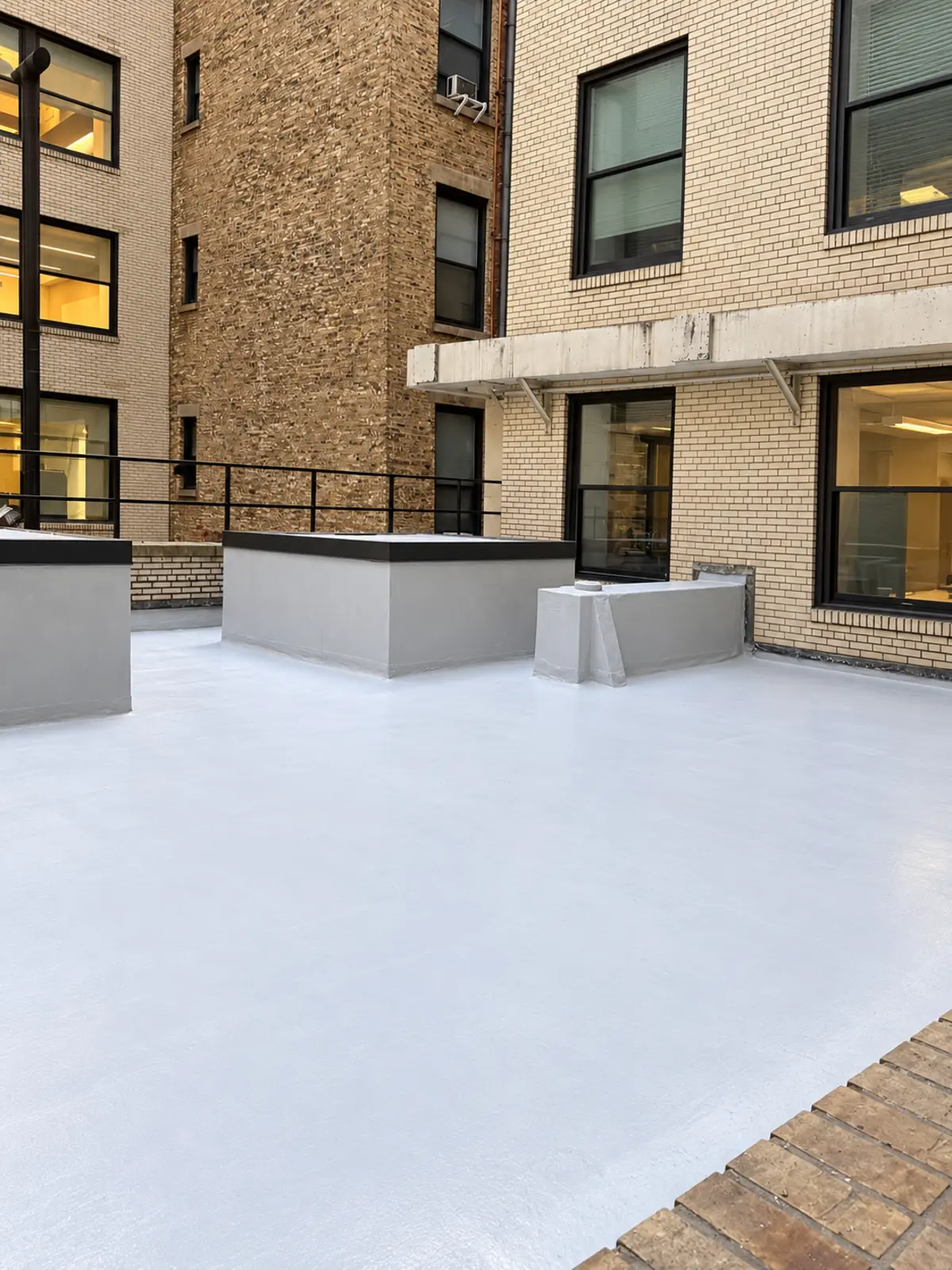Completed roof restoration with a clean waterproofed finish