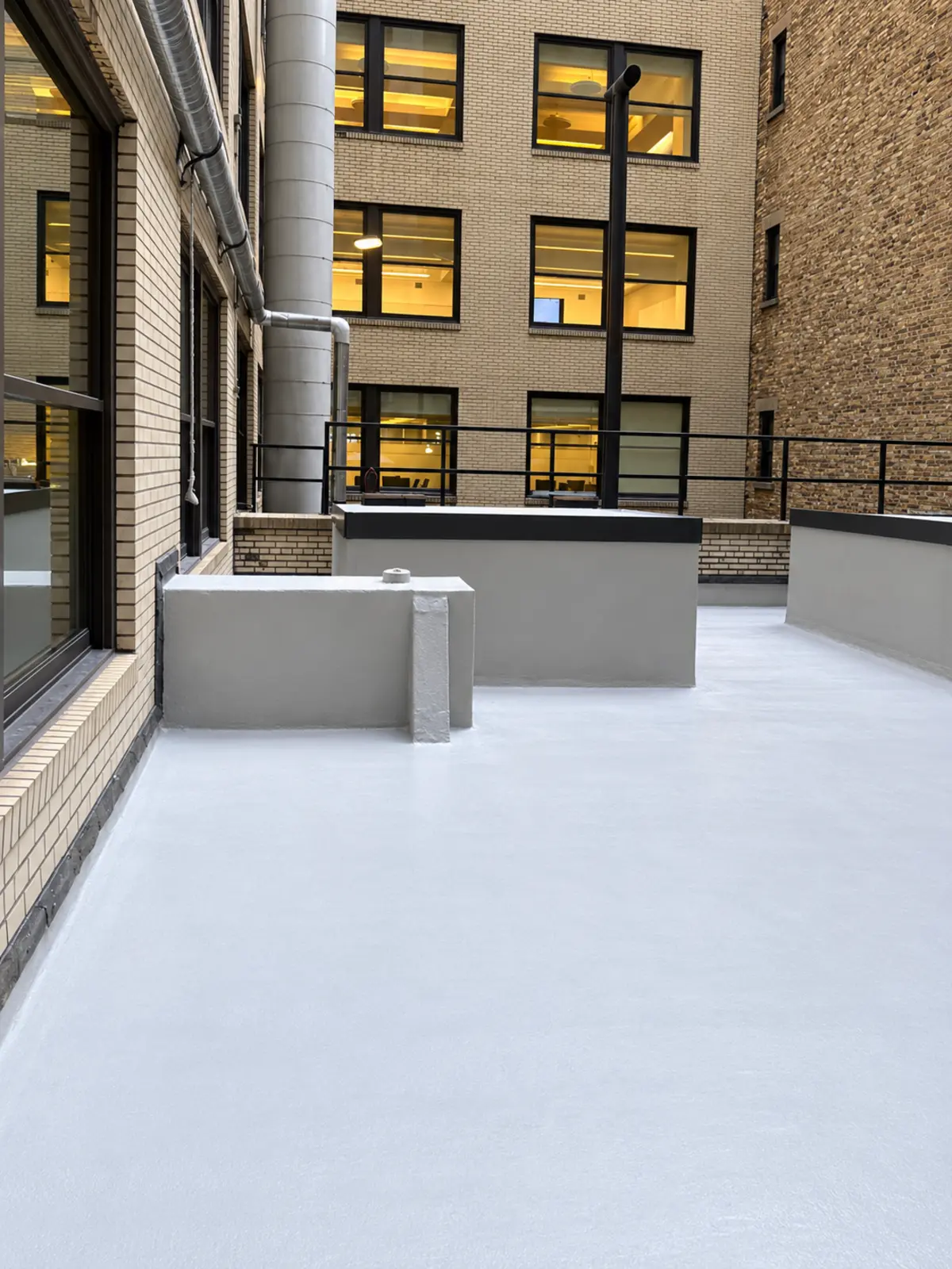Finished roof surface and completed waterproofing details